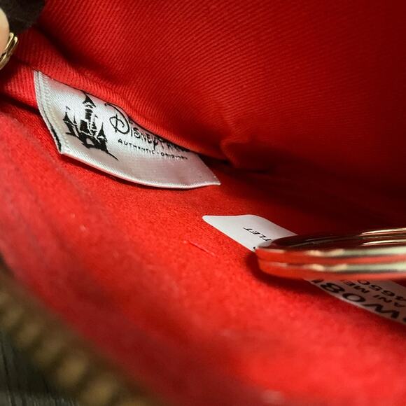 Dooney & Bourke Embossed Disney Aulani Wristlet NEW - Picture 10 of 15